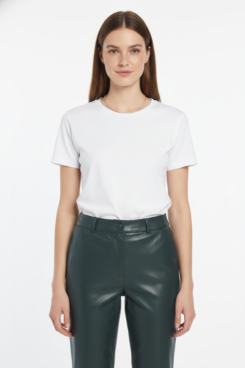 Dark green leather-look high-waist trousers — detail crop