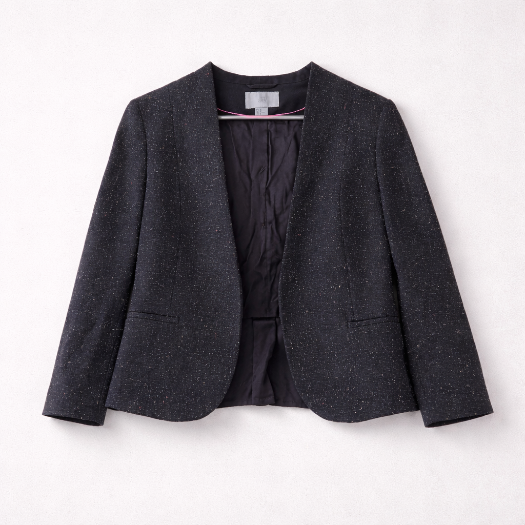 Kort åbenstående blazer med stumpeærmer