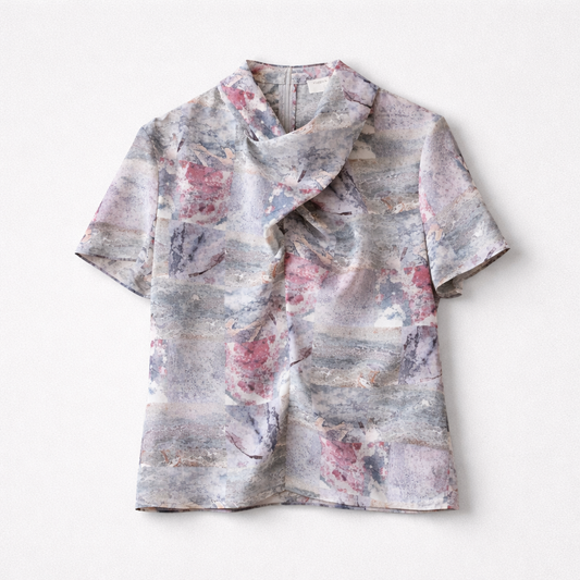 Bluse med abstrakt print og drape-detalje
