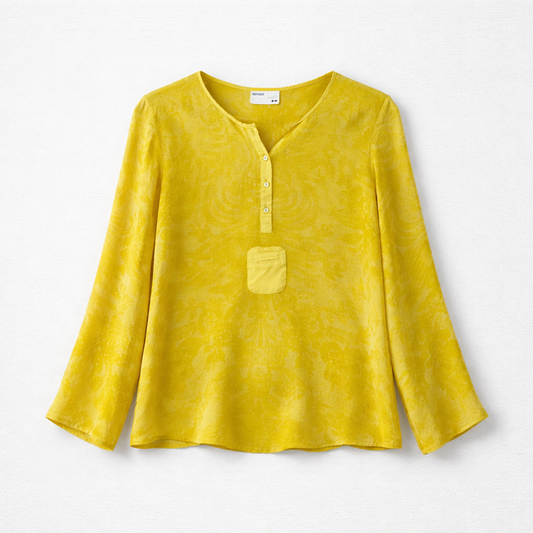 Gul let bluse med tone-i-tone mønster